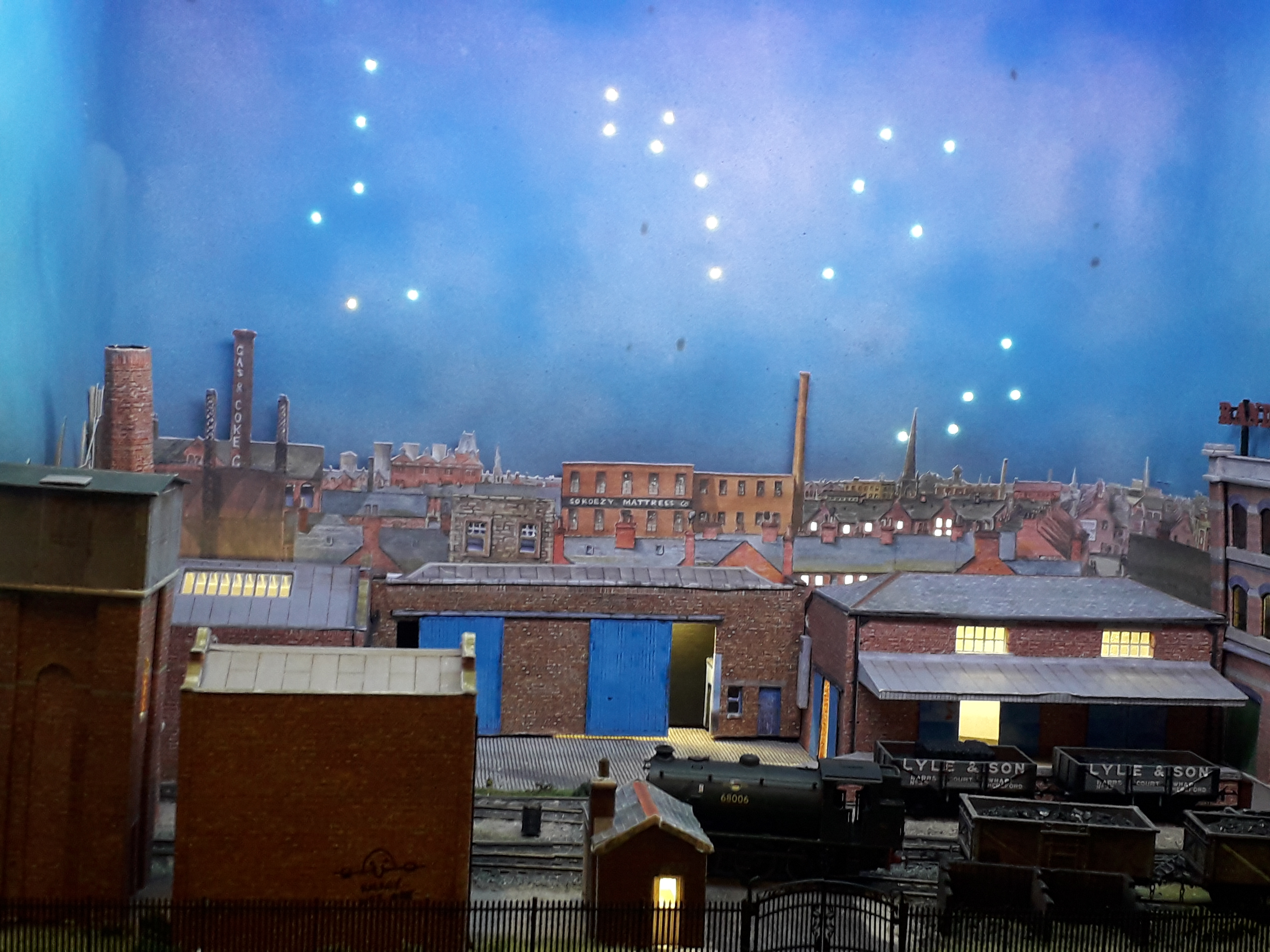 Randolphs Yard features in the Nov 2022 edition of Railway Modeller as packed with animations and special effects from its lighting rig, star-lit backscene to its smoking chimney and operating yard crane